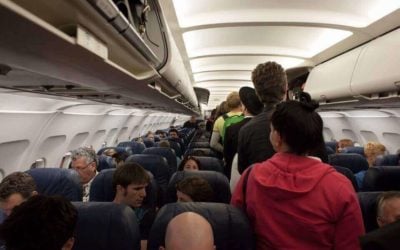 Why do airlines overbook flights & How not to get bumped into them?